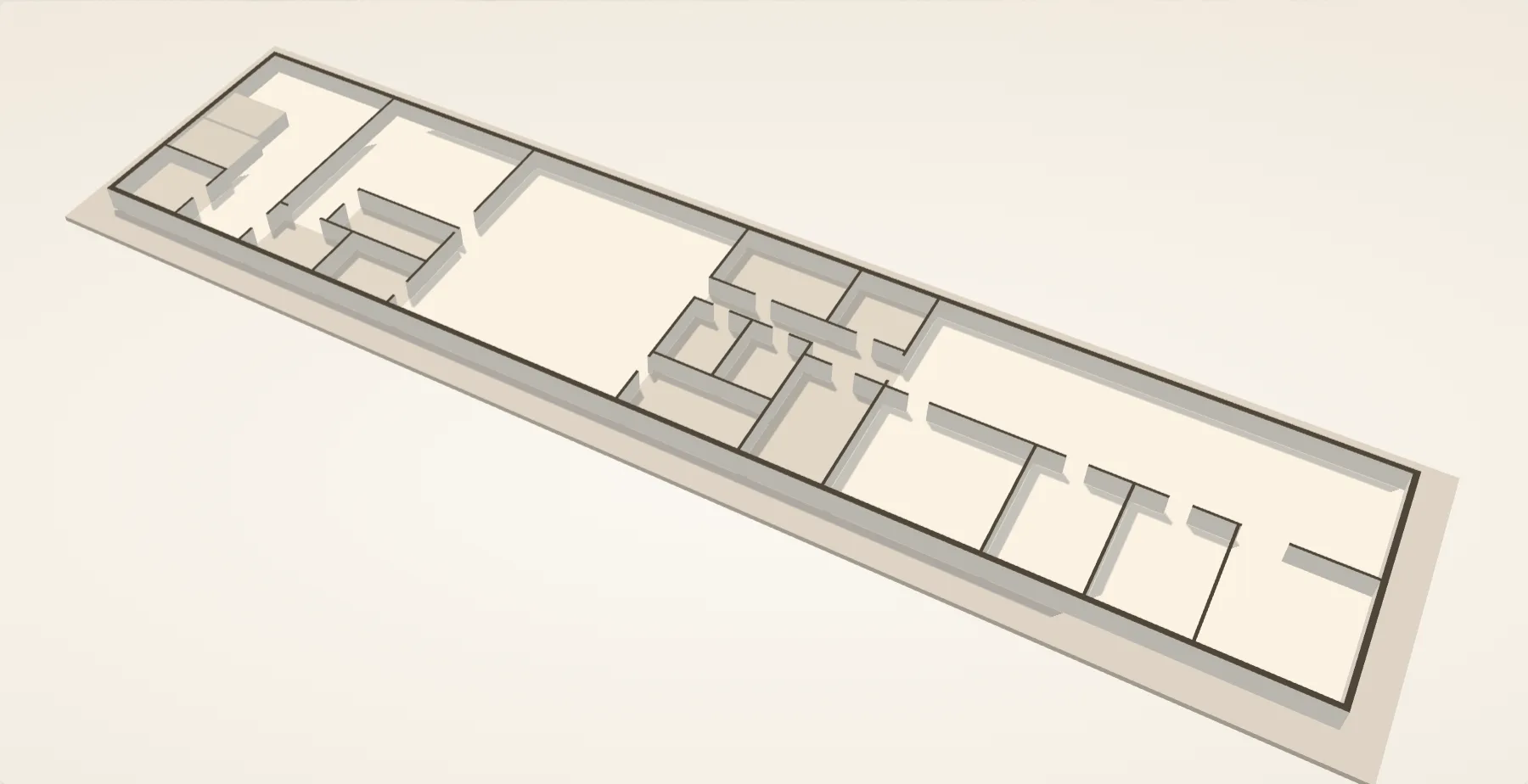 Cutaway model of The Atrium's interior seen from above, roof lifted off: the event space, kitchen, FeedTahoe and the makerspace rooms.